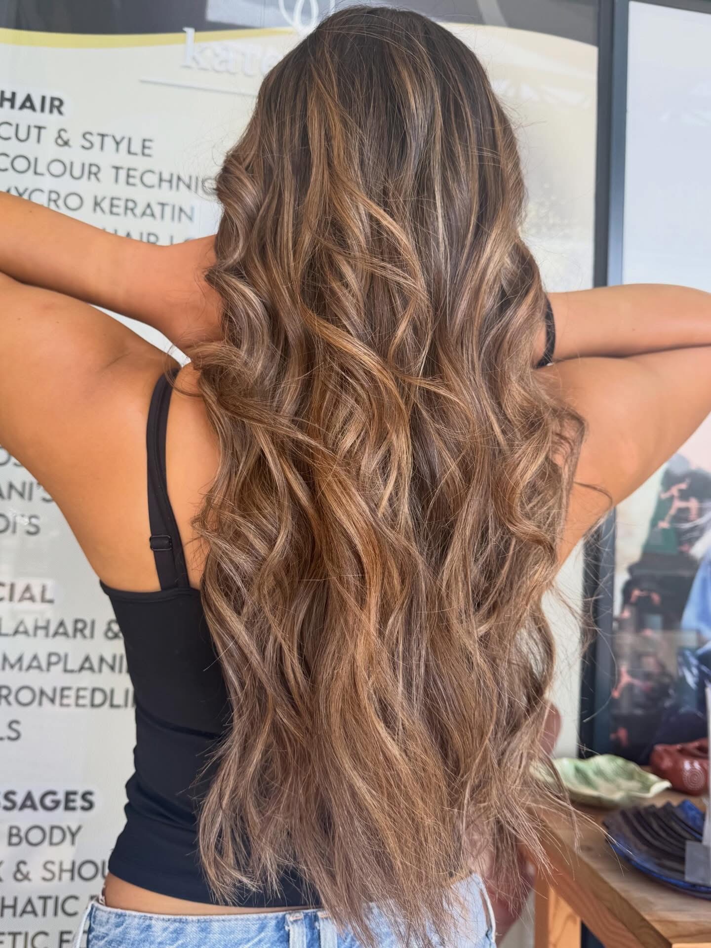 Rich brunette balayage with soft movement